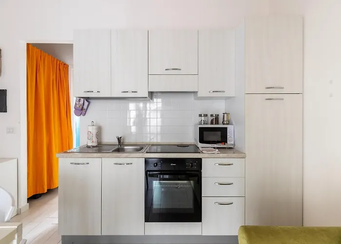 Attic With Terrace And Swimming Pool Apartment Badesi