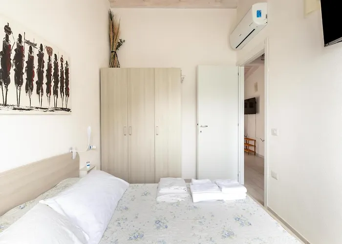 Attic With Terrace And Swimming Pool Badesi
